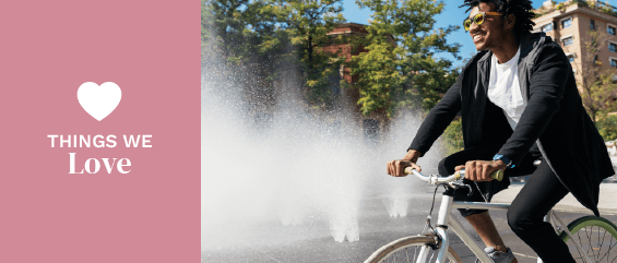 Things we love: Handsome afro man riding a bike.