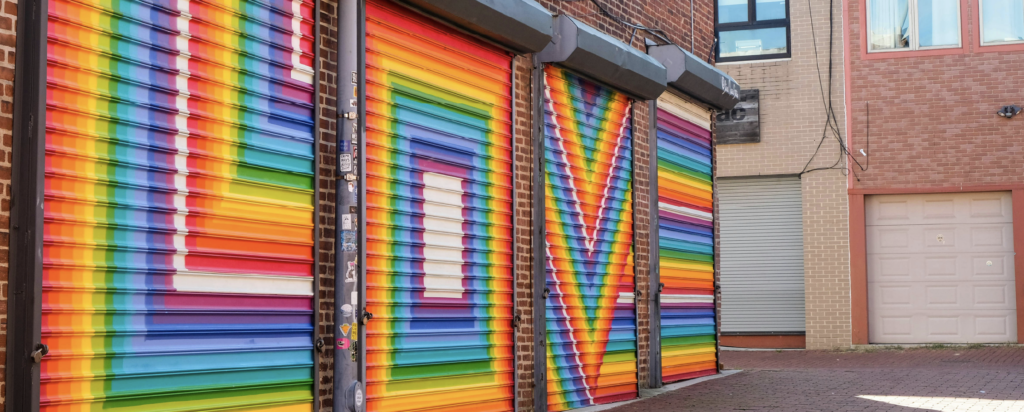 Rainbow colored LOVE on roll up doors Rainbow colored LOVE on roll up doors